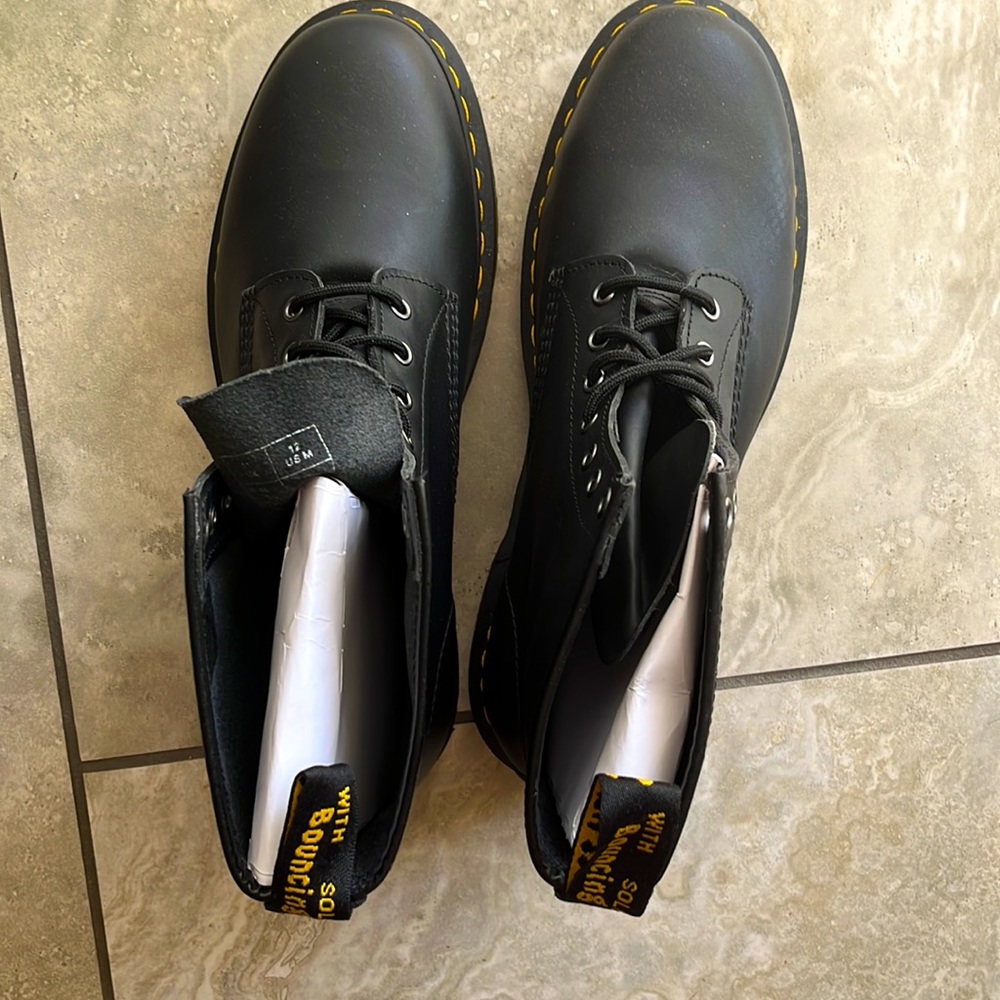 Never worn high top original Doc Martens.